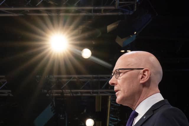 First Minister John Swinney