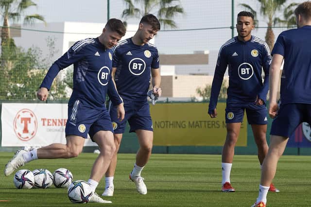 Kevin Nisbet and Jacob Brown flank Kieran Tierney during Scotland training in La Finca, Spain. (Photo by Jose Breton / SNS Group)