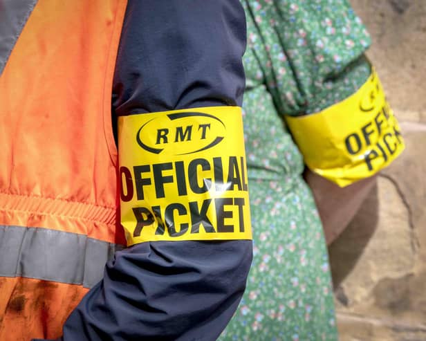 RMT members on the picket line outside Edinburgh's Waverley Station. Picture: Jane Barlow/PA Wire