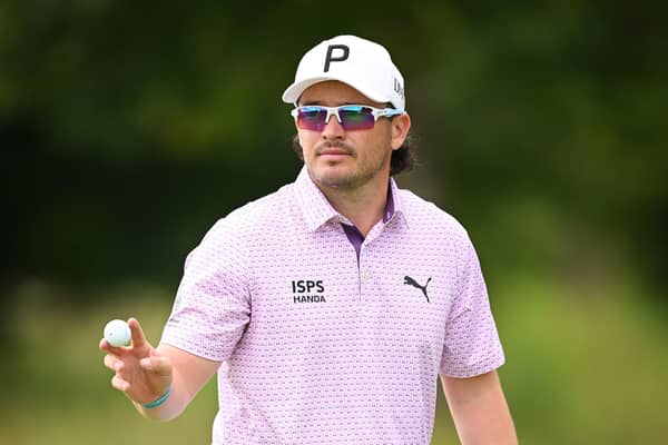 Ewen Ferguson of Scotland acknowledges the crowd following a birdie putt on the 14th green during day two of the BMW International Open at Golfclub Munchen Eichenried. (Photo by Stuart Franklin/Getty Images)
