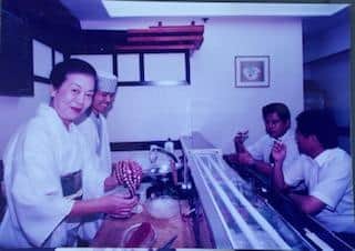 Ritsuko serving in her restaurant