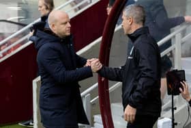 Hearts head coach Steven Naismith (L) and Hibs manager Nick Montgomery shake hands before the derby at Tynecastle earlier this season. Photo by Mark Scates / SNS Group