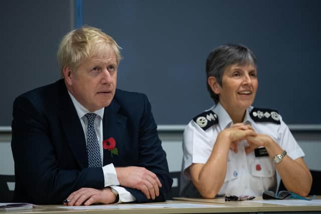 Prime Minister Boris Johnson and Police Commissioner Cressida Dick during a visit to Metropolitan Police training college in Hendon. Picture: Aaron Chown/PA Wire
