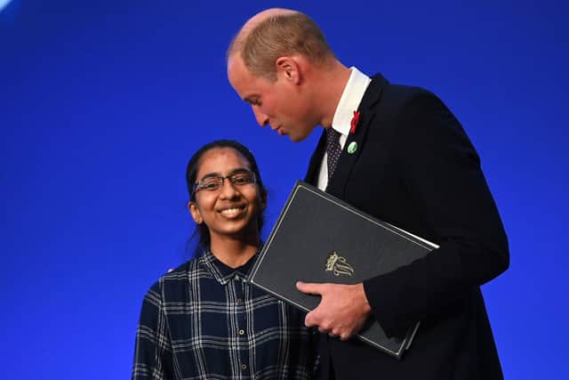 The Duke of Cambridge with Earthshot Prize finalist Vinisha Umashankar during a session on 'Accelerating clean technology innovation and deployment' with world leaders and individuals from the private sector during the Cop26 summit at the Scottish Event Campus (SEC) in Glasgow. Picture date: Tuesday November 2, 2021. PA Photo. See PA story ENVIRONMENT Cop26. Photo credit should read: Jeff J Mitchell/PA Wire