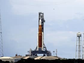 The NASA moon rocket stands ready less than 24 hours before it is scheduled to launch on Pad 39B for the Artemis 1 mission to orbit the moon at the Kennedy Space Center, Sunday, Aug. 28, 2022, in Cape Canaveral, Fla. (AP Photo/John Raoux)