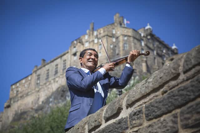 Gheorghe ‘Caliu’ Anghel of the Romany folk group Taraf de Caliu warming up for the band's Edinburgh International Festival concert at Leith Theatre. 
Picture: Jessica Shurte