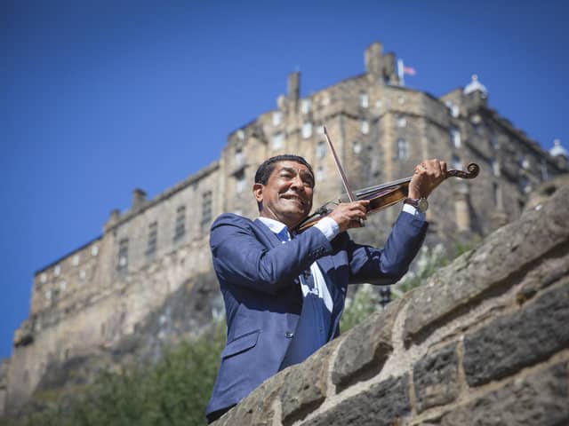 Gheorghe ‘Caliu’ Anghel of the Romany folk group Taraf de Caliu warming up for the band's Edinburgh International Festival concert at Leith Theatre. 
Picture: Jessica Shurte