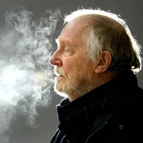 Mike Hodges poses at the 2004 Sundance Film Festival (Picture: Carlo Allegri/Getty Images)