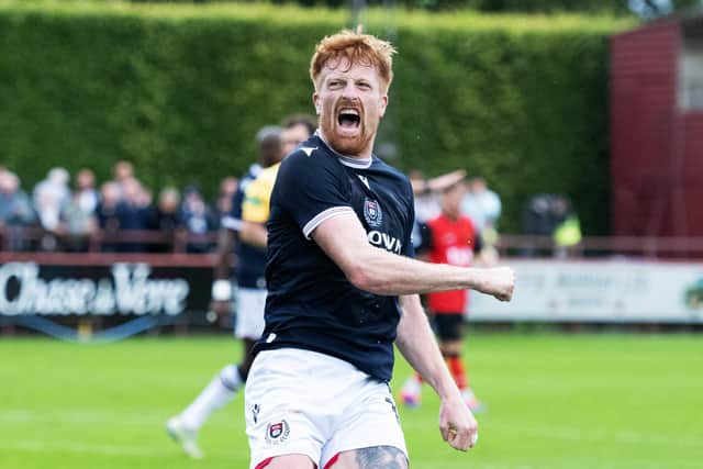 Simon Murray celebrates after scoring Dundee's opener in the 3-1 win over Annan at Glebe Park.  (Photo by Paul Devlin / SNS Group)