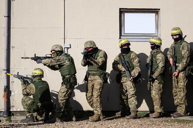 Ukrainian military personnel take part in a training exercise at a facility on November 09, 2022 in southeast England (Photo by Leon Neal/Getty Images)