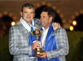 Paul Lawrie celebrates with captain Jose Maria Olazabal after Europe's win in the 2012 Ryder Cup at Medinah. Picture: Ross Kinnaird/Getty Images.