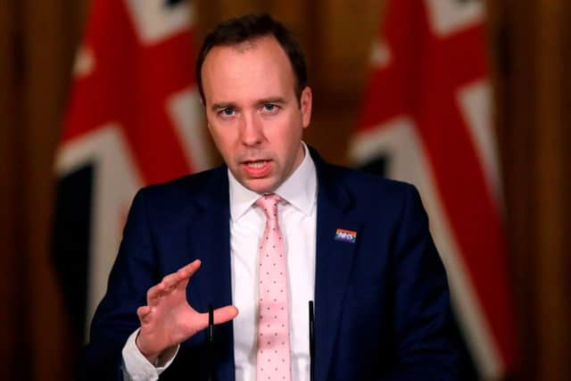 Health Secretary Matt Hancock said 'we're placing immediate restrictions on travel from South Africa', after two cases of a 'highly concerning' new virus strain were discovered (Photo: KIRSTY WIGGLESWORTH/POOL/AFP via Getty Images)