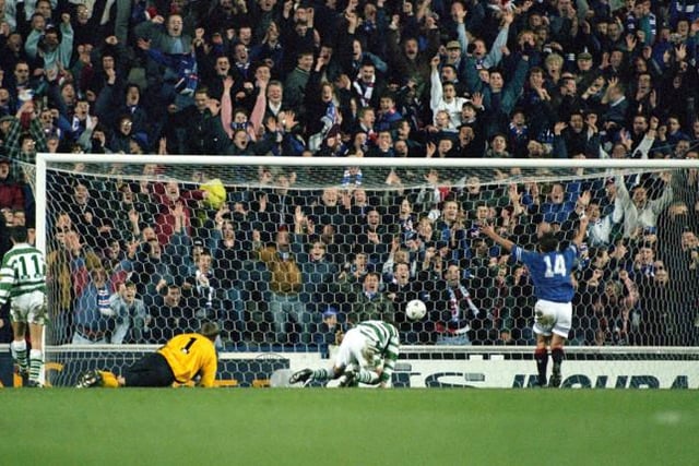 19/11/95 - Tosh McKinlay knocked in Rangers' third, much to Ally McCoist's delight and sent the home side 3-2 ahead, but Celtic pulled them back again to draw 3-3