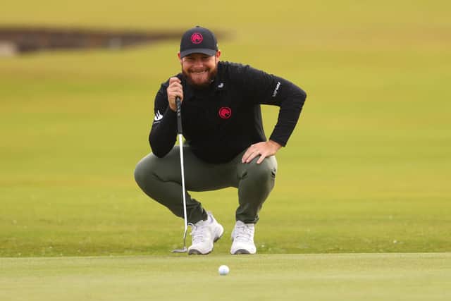 Tyrrell Hatton smiles as he lines up a putt on the first green at St Andrews during day three of the Alfred Dunhill Links Championship. Picture: Kate McShane/Getty Images.