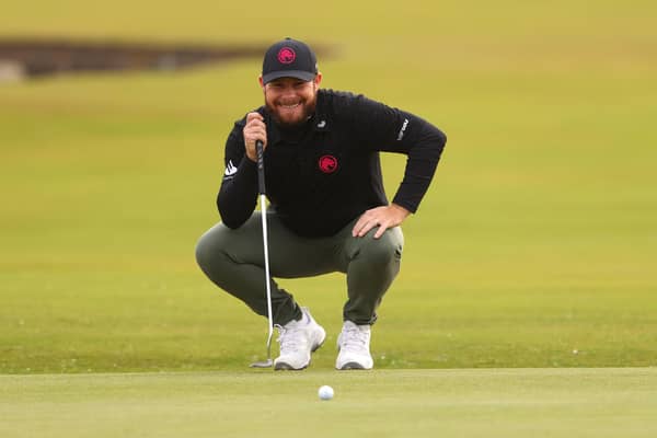 Tyrrell Hatton smiles as he lines up a putt on the first green at St Andrews during day three of the Alfred Dunhill Links Championship. Picture: Kate McShane/Getty Images.