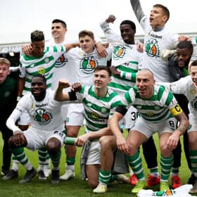 Celtic celebrate winning the title last season. Picture: SNS