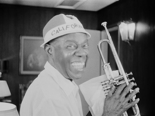 American jazz singer and nusician Louis Armstrong recorded We Have All The Time in the World for 1969 Bond film On Her Majesty's Secret Service - George Lazenby's only outing as 007. It had to wait a while for chart success though - peaking at number three in 1994 after featuring in a Guiness advert.