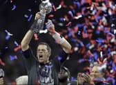 Tom Brady won a number of superbowls with both the New England Patriots and the Tampa Bay Buccaneers.