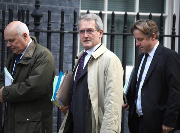Owen Paterson, centre, pictured outside Downing Street in October 2019 (Picture: Leon Neal/Getty Images)