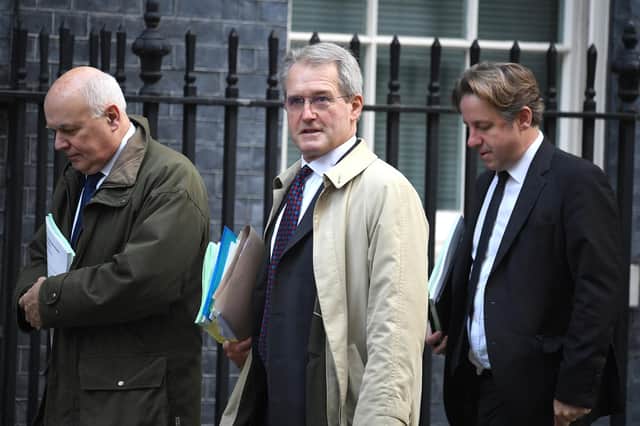 Owen Paterson, centre, pictured outside Downing Street in October 2019 (Picture: Leon Neal/Getty Images)