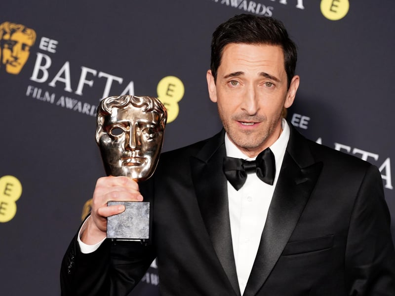 Adrien Brody in the press room after winning the Best Actor in a Leading Role award for The Brutalist during the 78th British Academy Film Awards