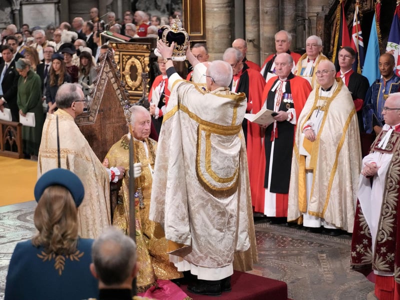 King Charles III receives The St Edward's Crown during his coronation ceremony in Westminster Abbey, London.