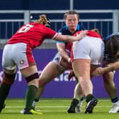 Anne Young (centre) in action for Scotland during the Six Nations defeat to Wales at the DAM Health Stadium on April 1st. (Photo by Ross Parker / SNS Group)