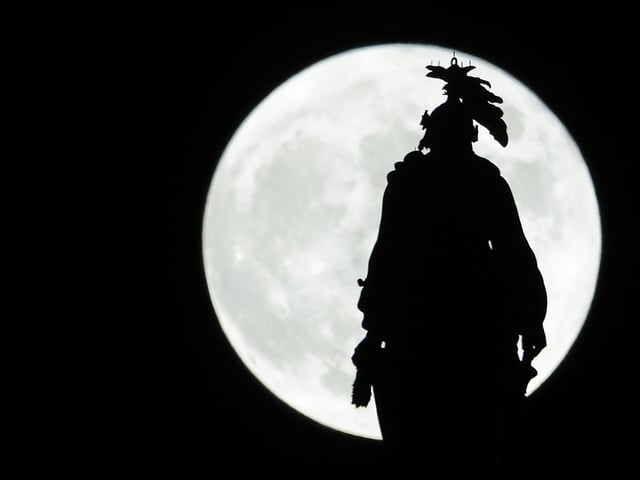 The Statue of Freedom that crowns the U.S. Capitol dome.