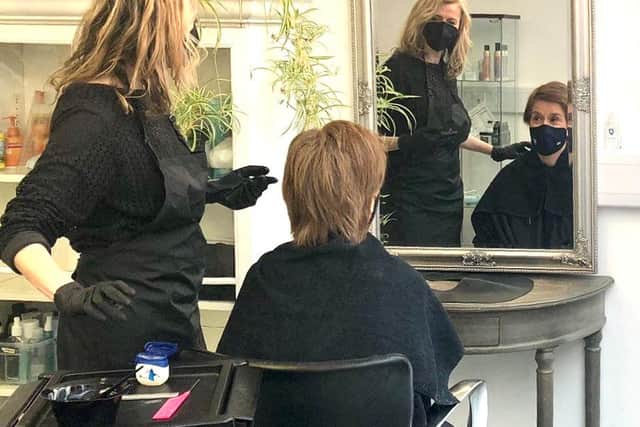 Julie McGuire cuts the First Minister's hair at her salon on Dalmeny Street, Edinburgh.