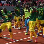 Mali's forward Ibrahima Kone (L) celebrates with teammates after scoring what proved to be the winner in a controversial AFCON match against Tunisia  (Photo by ISSOUF SANOGO/AFP via Getty Images)