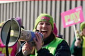 Teachers from the Educational Institute of Scotland (EIS) union take part in a rally outside the Tramway in Glasgow