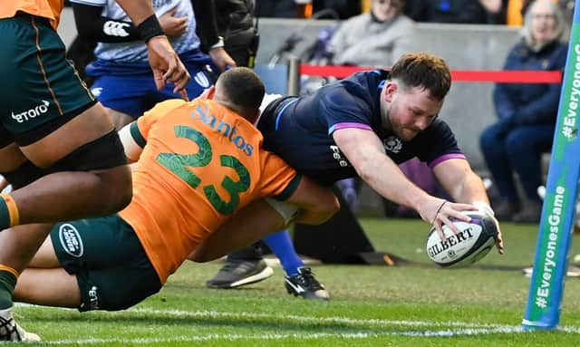 Ewan Ashman scores for Scotland against Australia.