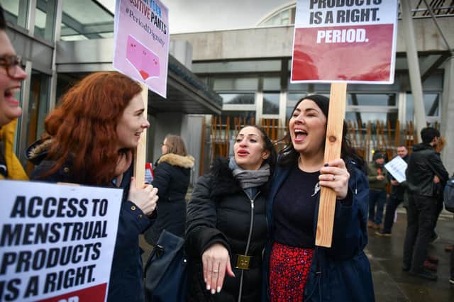 Scottish Labour MSP Monica Lennon, right, joins campaigners during a rally outside the Scottish Parliament in support of the Period Products Bill (Picture: Jeff J Mitchell/Getty Images)