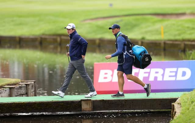 Bob MacIntyre and caddie Mikey Thomson walk to the 10th green during the first round of The Betfred British Masters hosted by Danny Willett at The Belfry. Picture: Richard Heathcote/Getty Images.