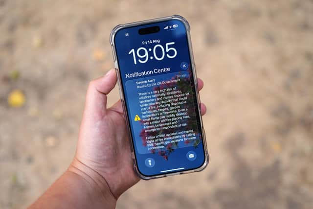 The mobile phone alert sytsem message sent to millions of people on Friday warning them against lighting anything that could spark a wildfre (PictureL Annabel Lee-Ellis/PA Wire)
