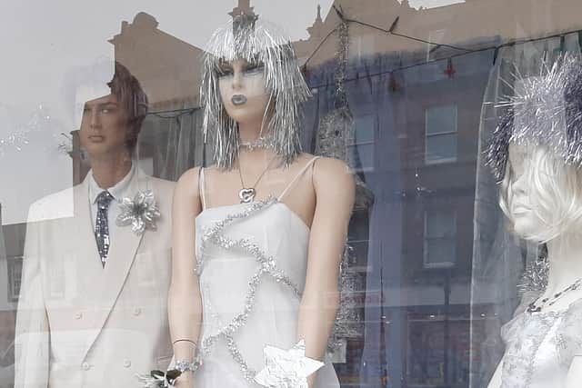 A winter bride shines on in Annan, from Manikins by Mark Jones.