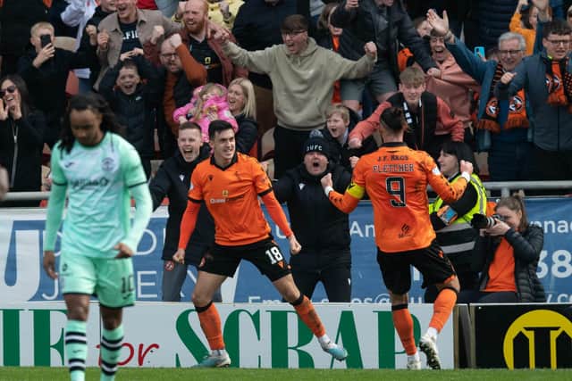 Dundee United's Jamie McGrath celebrates after scoring a late penalty to clinch a 2-1 over Hibs. (Photo by Ross Parker / SNS Group)