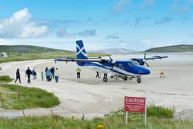 Barra's beach runway hosts some 13,000 passengers a year