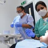 Dentist Kusum Chawla with dental nurse Jayde Williamson. Picture: Stu Norton