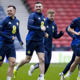 Lawrence Shankland and John Souttar cast a smile during training ahead of facing Northern Ireland on Tuesday.
