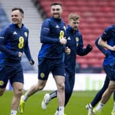Lawrence Shankland and John Souttar cast a smile during training ahead of facing Northern Ireland on Tuesday.