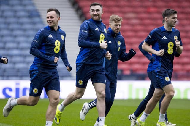 Lawrence Shankland and John Souttar cast a smile during training ahead of facing Northern Ireland on Tuesday.