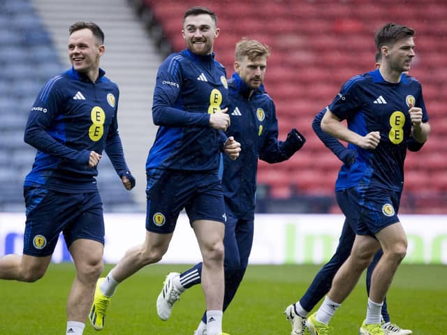 Lawrence Shankland and John Souttar cast a smile during training ahead of facing Northern Ireland on Tuesday.