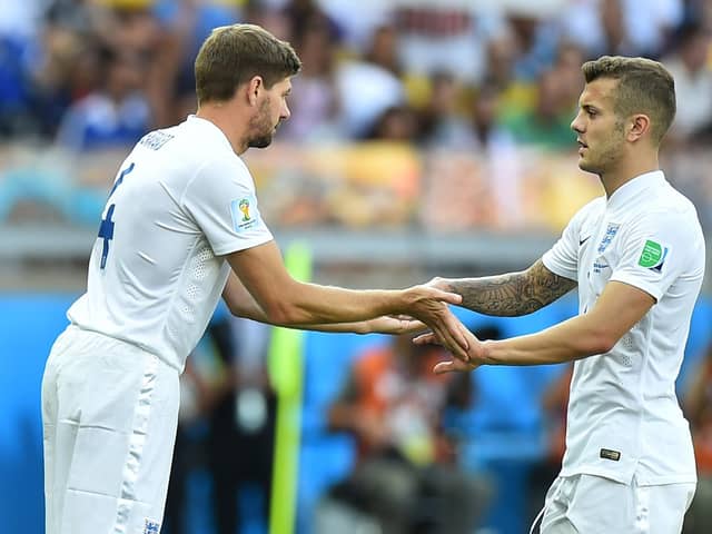 Jack Wilshere is replaced by Steven Gerrard during England's game against Costa Rica at the 2014 World Cup Finals in Brazil. (Photo BEN STANSALL/AFP via Getty Images)
