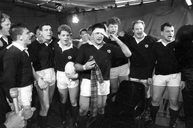 Team captain David Sole leads the squad in a song at Murrayfield after their 13-7 Calcutta Cup win over England.