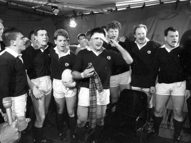 Team captain David Sole leads the squad in a song at Murrayfield after their 13-7 Calcutta Cup win over England.