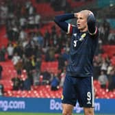 Scotland's Lyndon Dykes reacts to a missed chance during the 0-0 draw with England at Wembley (Photo by JUSTIN TALLIS/POOL/AFP via Getty Images)