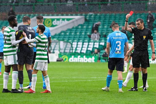 Dundee's Jordan Marshall is sent off for a foul on Celtic's Liel Abada during a cinch Premiership match between Celtic and Dundee at Celtic Park, on August 08, 2021.