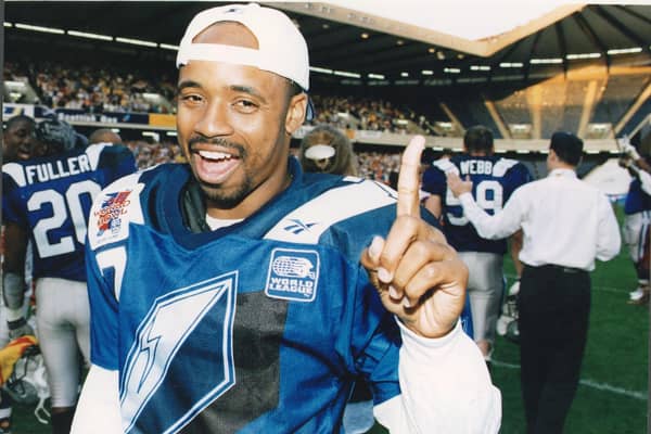 Khari Jones,  celebrates winning the World Bowl in 1996.