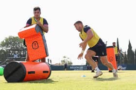 Kyle Steyn (right) participates in a drill during a Scotland training session at Stade des Arboras in Nice, France. (Photo by Cameron Spencer/Getty Images)